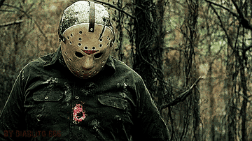 Jason looks up in the middle of a forest
