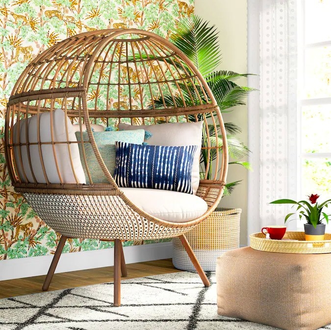 Egg chair styled with patterned pillows