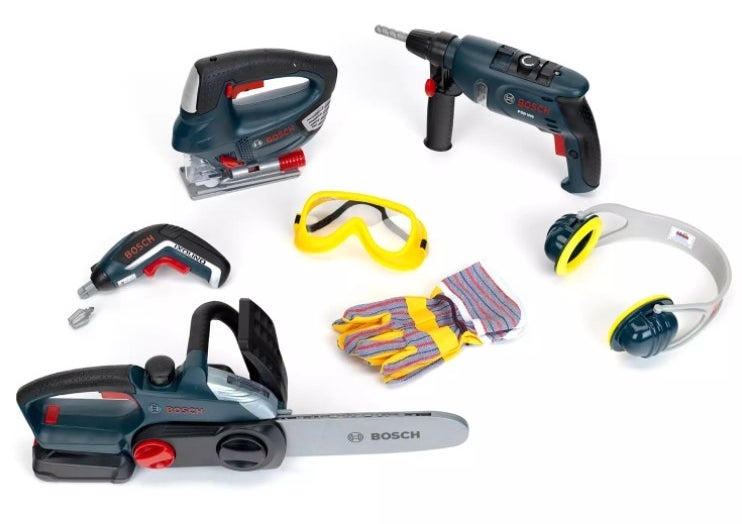 A large power tool set that includes one Bosch drill II, one Bosch chainsaw II, one Bosch cordless screwdriver Ixolino II, one Bosch jigsaw II, a pair of earmuffs, a pair of gloves, a pair of goggles, and batteries
