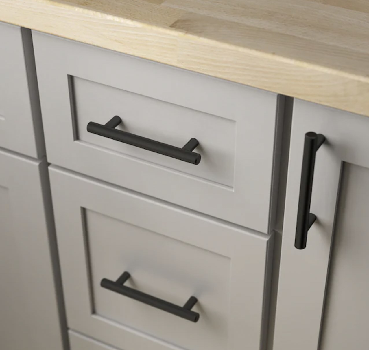 the drawer pull in black on cabinets