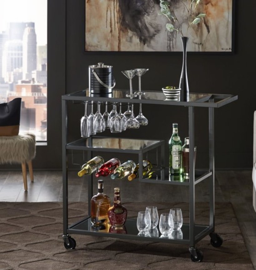 A matte black metal and mirrored top bar cart with four shelves, four wine racks, and 4 stemware racks