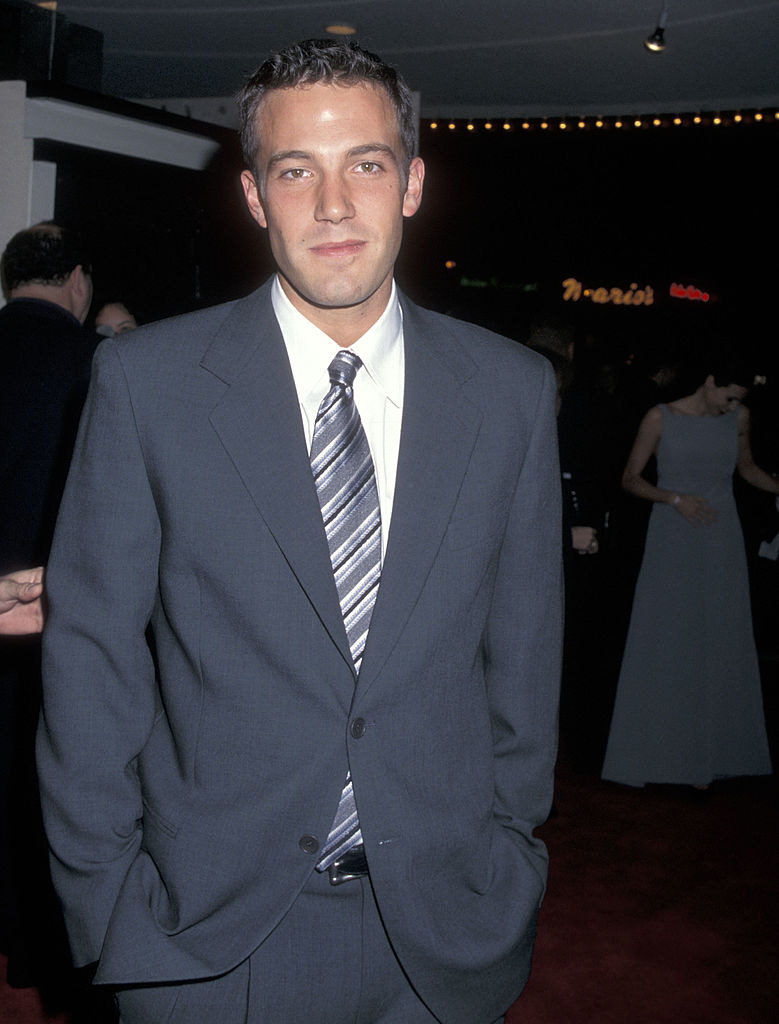 in 1997 in a baggy 90s suit