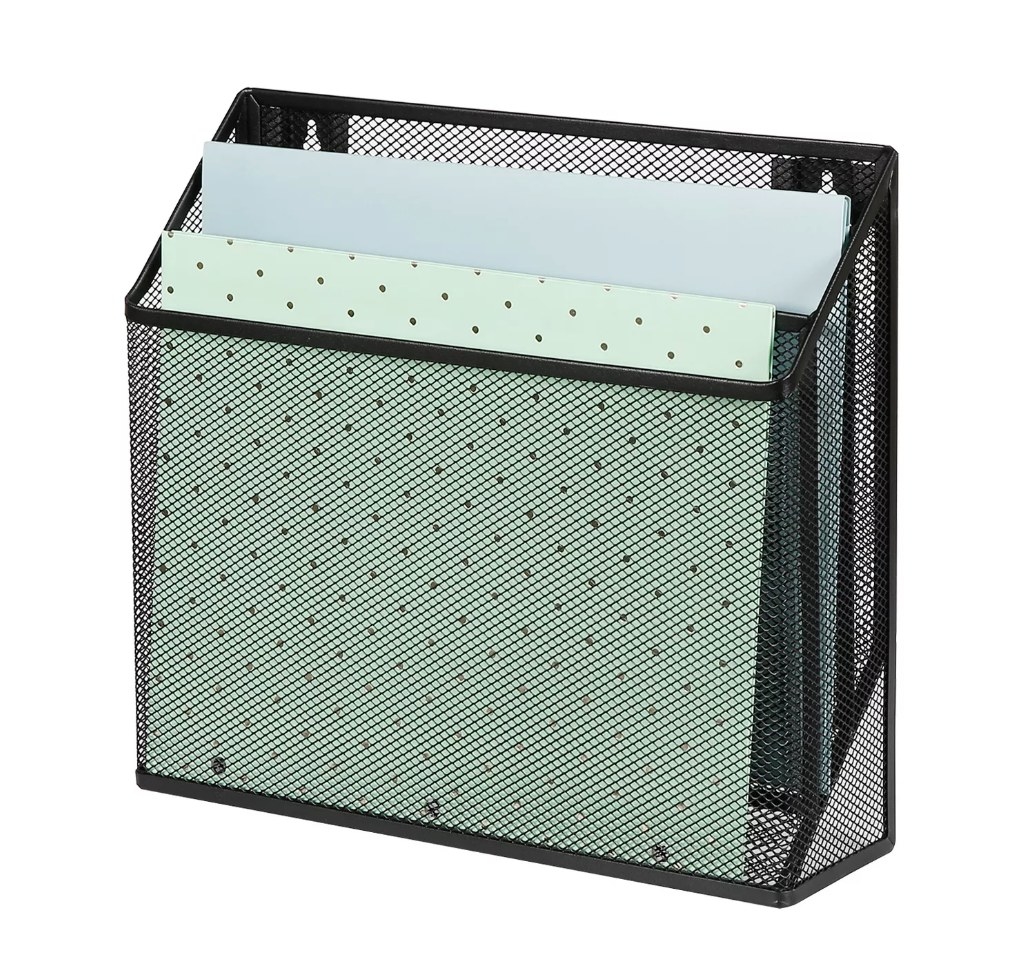 Black mesh hanging file organizer with papers inside