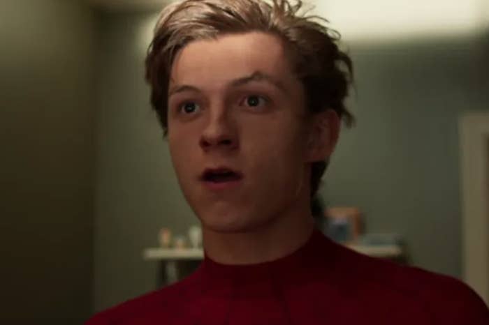 A close up of Peter Parker with his mouth open