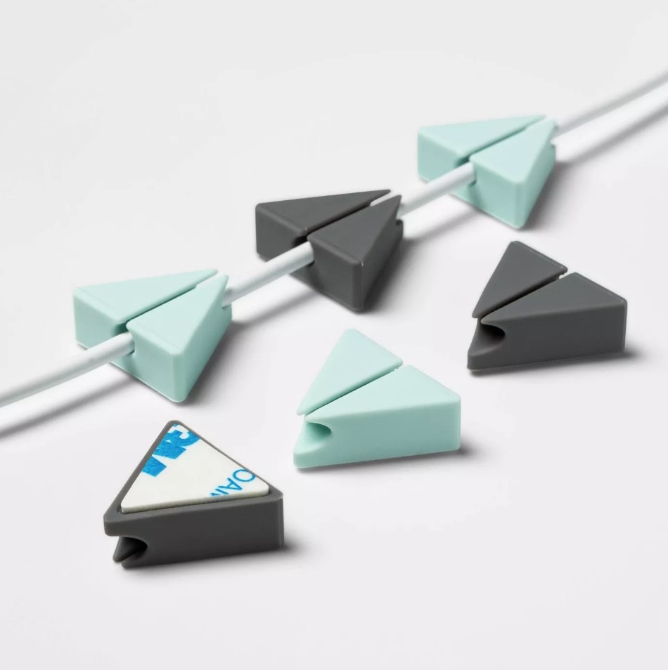 Gray and light blue triangle shaped cord holders