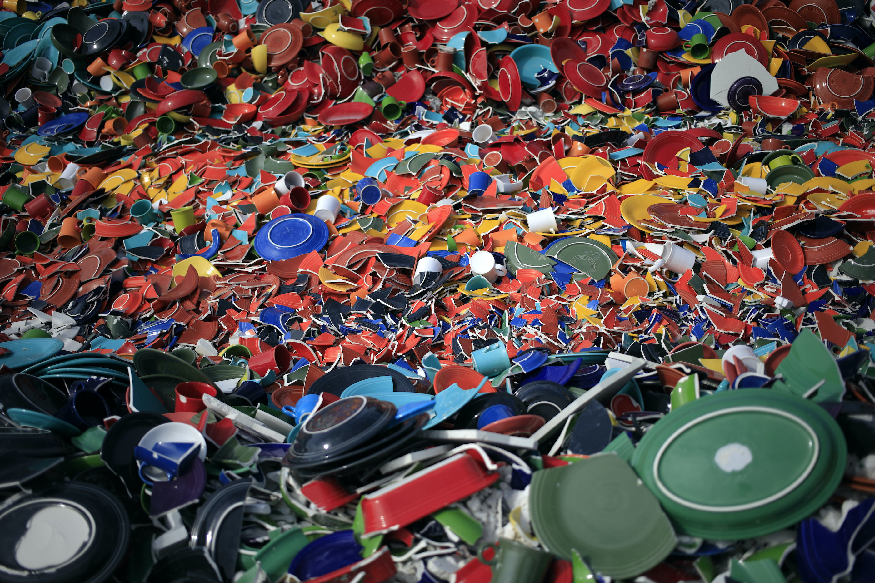 Broken plates are piled for recycling at a Fiesta Tableware site