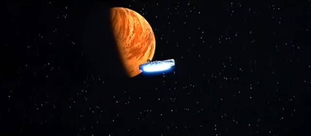 The Millenium Falcon flying to Yavin IV in &quot;Star Wars: Episode IV - A New Hope&quot;