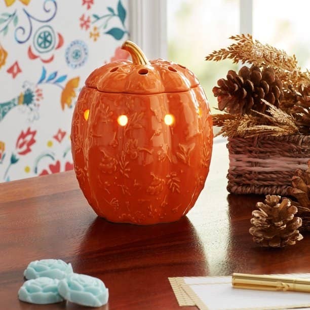 Pumpkin shaped wax warmer with embossed floral pattern