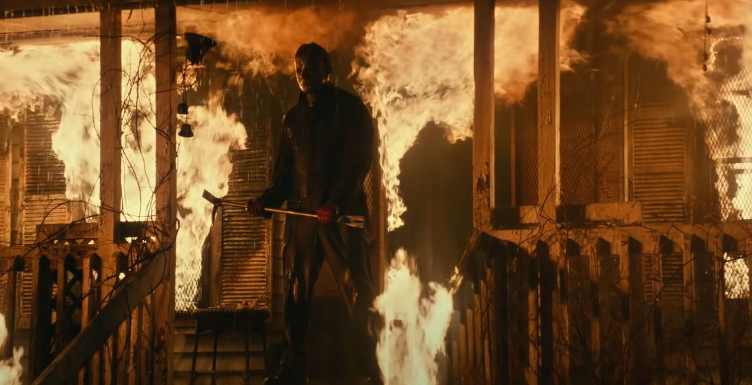 Michael Myers leaving a burning house in Halloween Kills