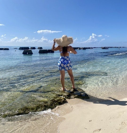 BuzzFeed Editor standing by the ocean