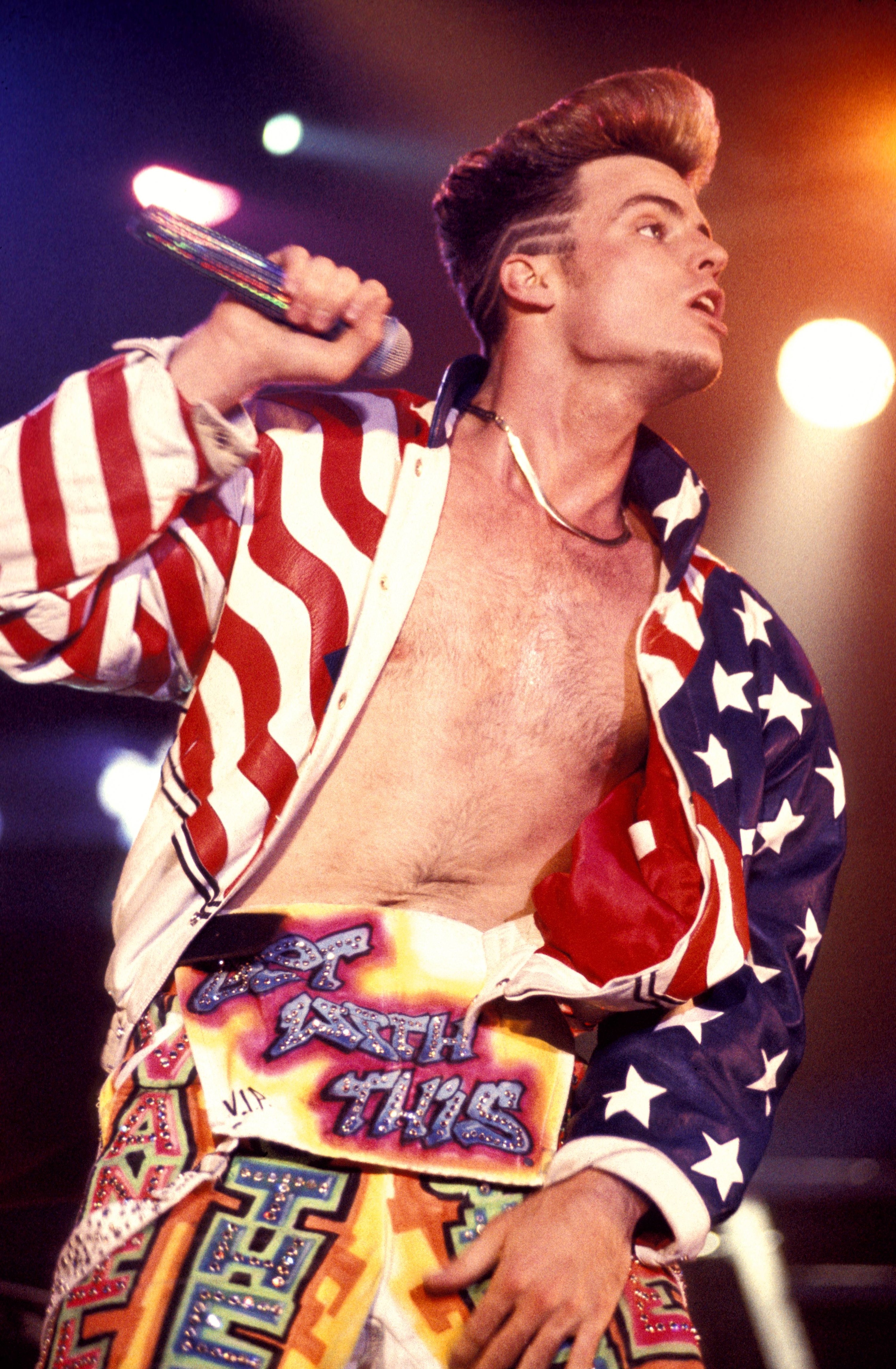 Vanilla Ice onstage with flashy clothes