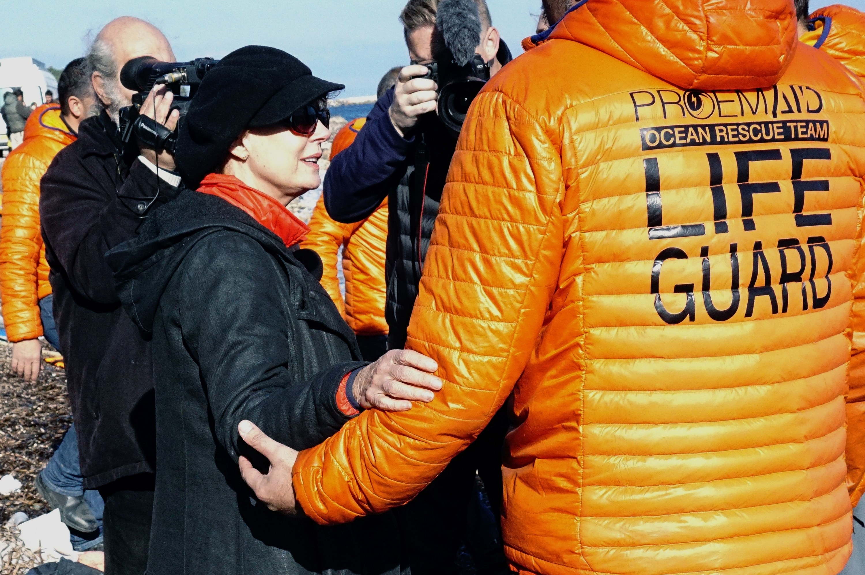 Susan stands with other volunteers in Lesbos