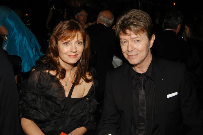 Susan and David sit next to each other and smile at an event before his passing