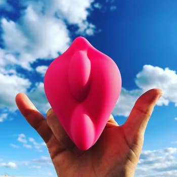 Model holding pink Bumpher base