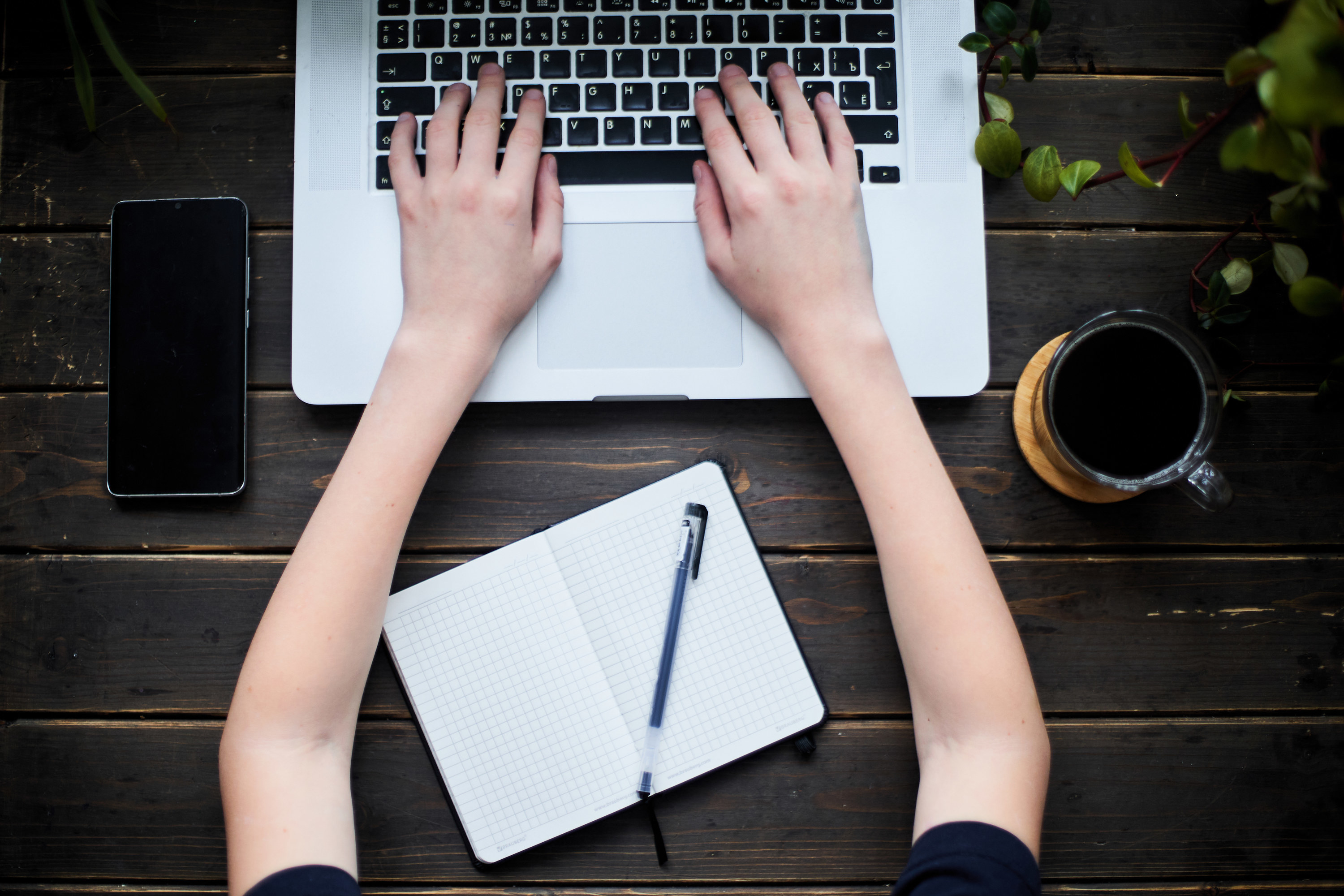 Person typing on a laptop