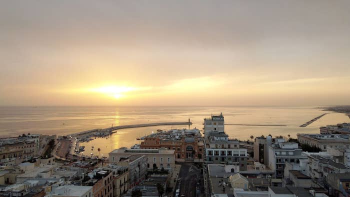 City of Bari with a cloudy sunrise over the sea