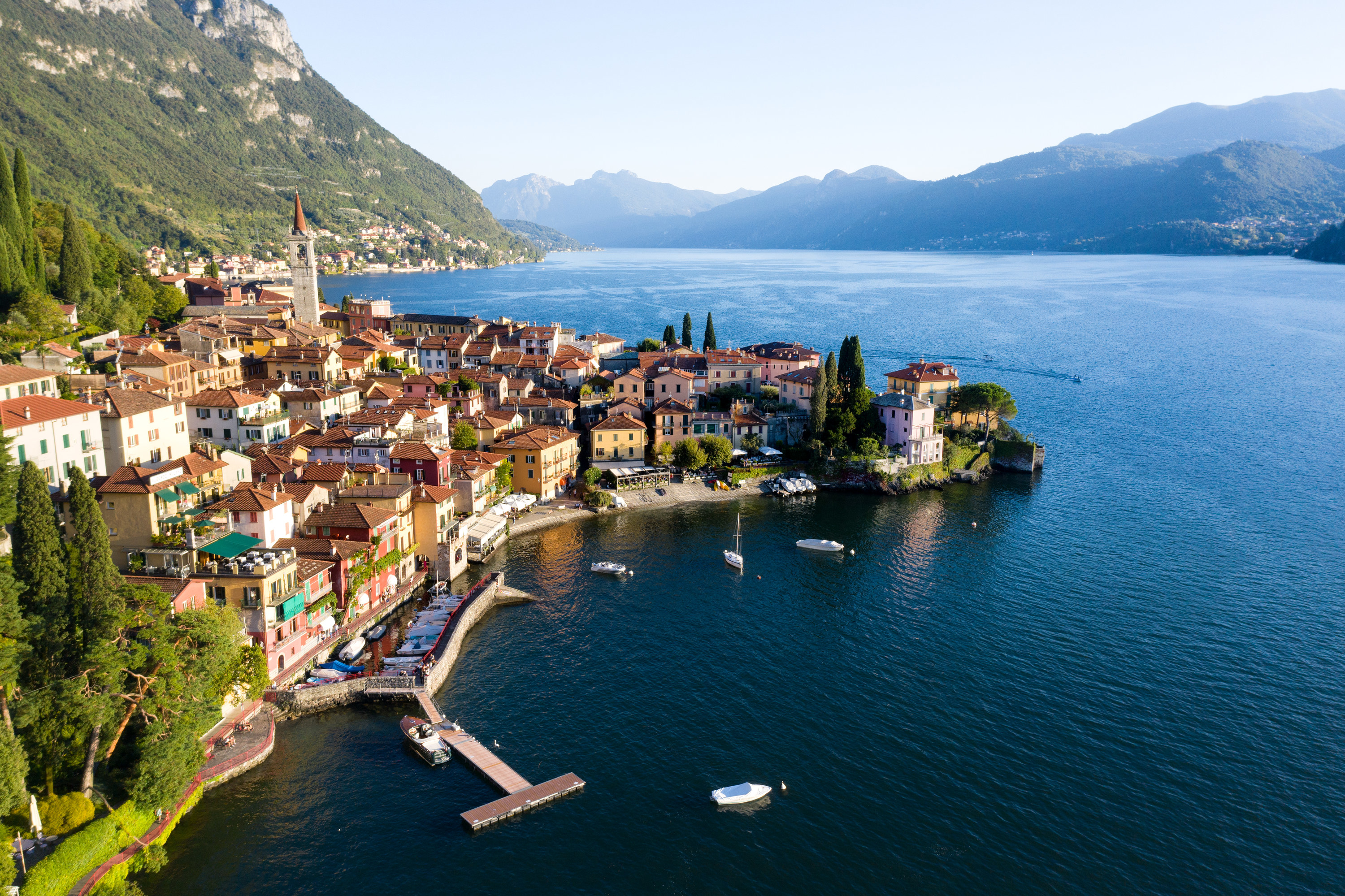 Overhead view of Lake Como and a small town on a peninsula leading into the lake.