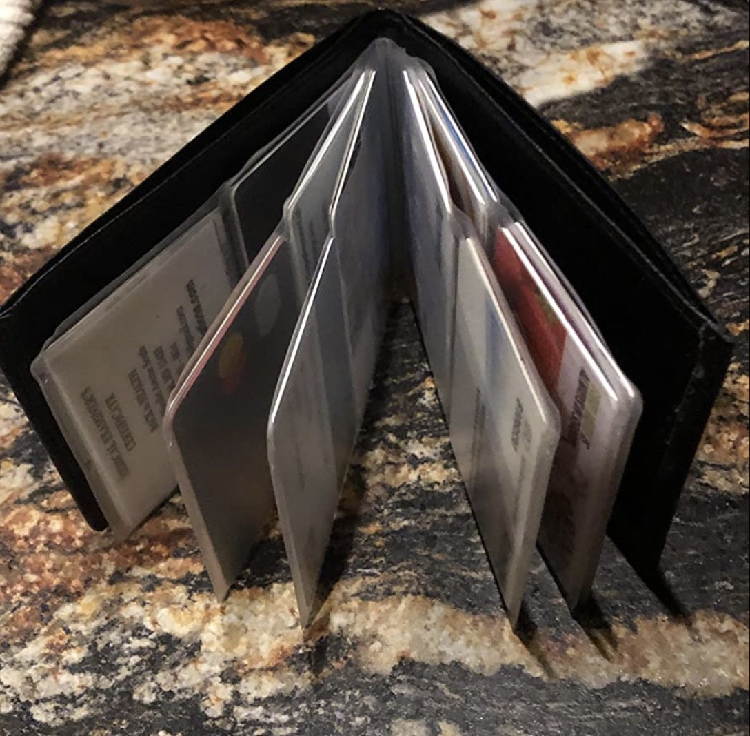 reviewer photo of the magic wallet opened, revealing the multitude of card slots