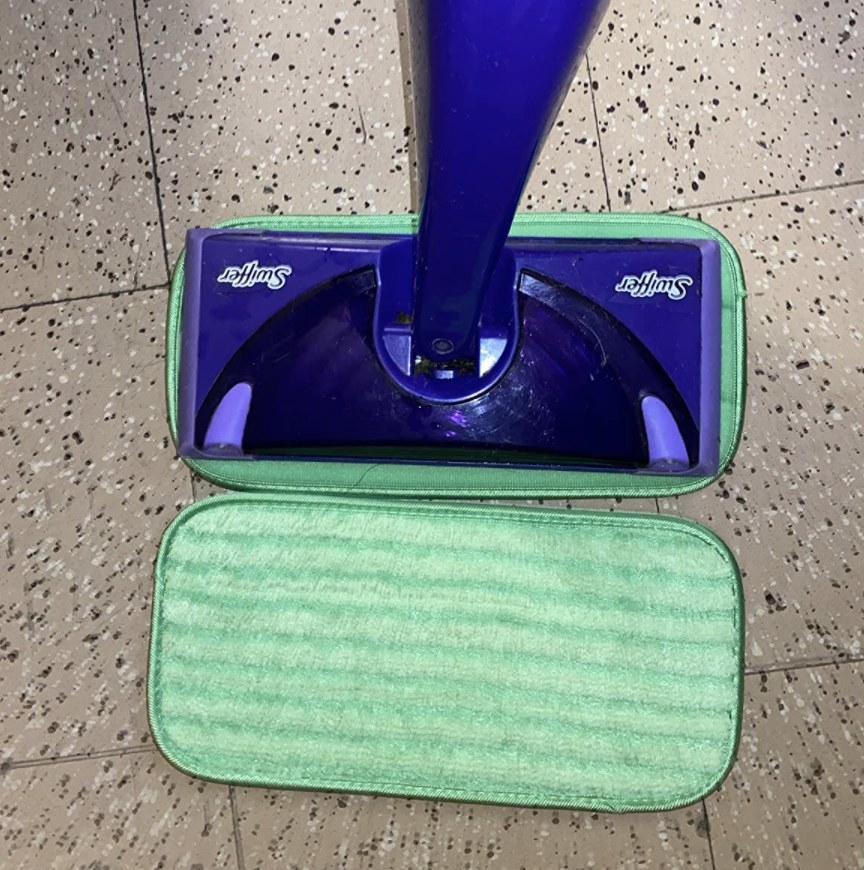 reviewer photo showing the reusable pads being used with a Swiffer