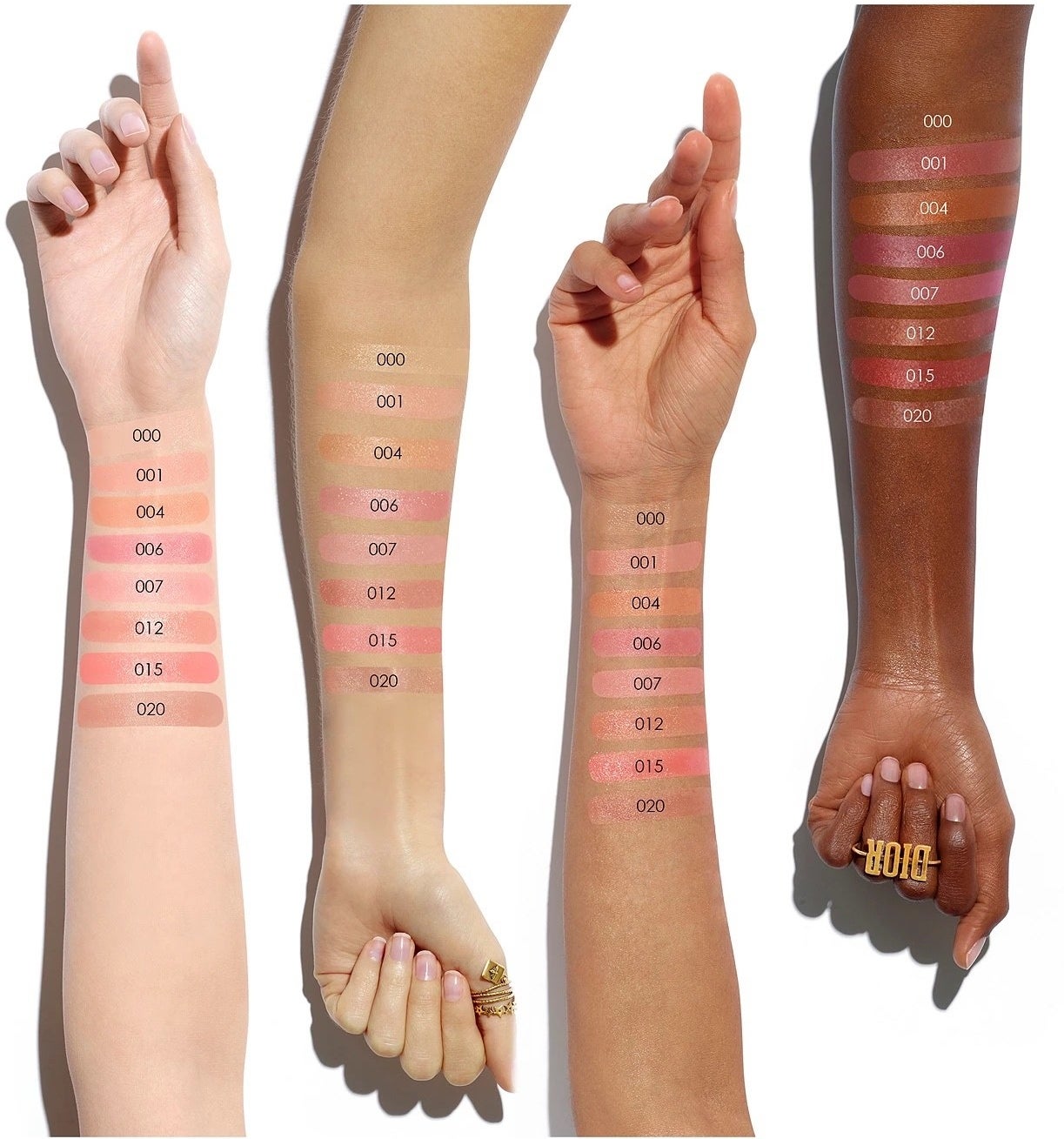 Models with swatches of lip balm on them