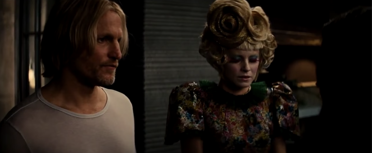 Haymitch and Effie saying goodbye to Peeta and Katniss before the quarter quell
