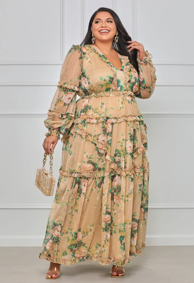 reviewer wearing the ruffle floral dress in tan