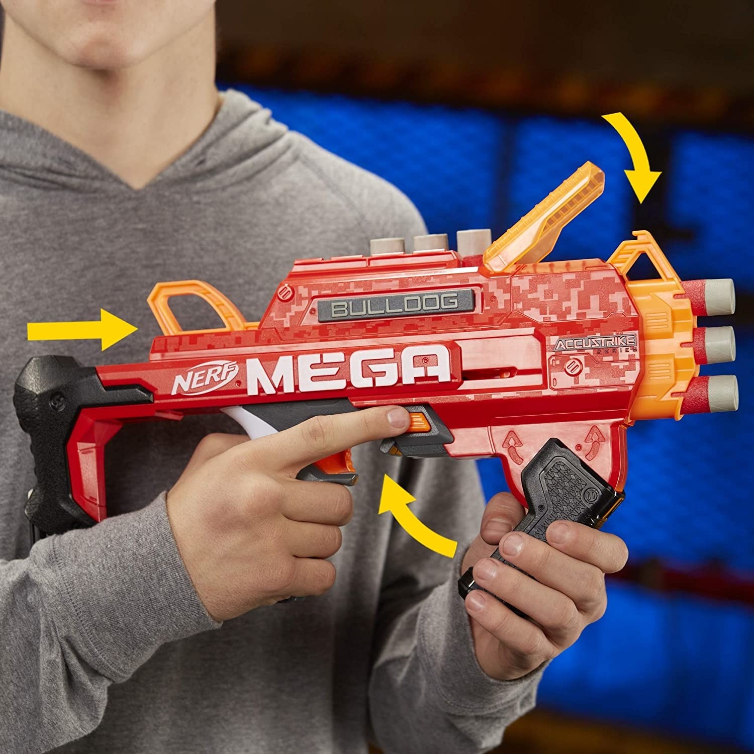 A person holding the Nerf gun