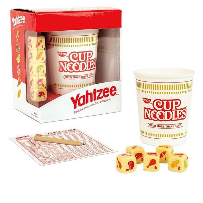 box with faux cup noodles container and dice that look like bullion cubes