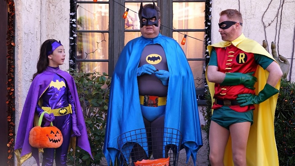 The Pritchett family dressed as Batgirl, Batman, and Robin.