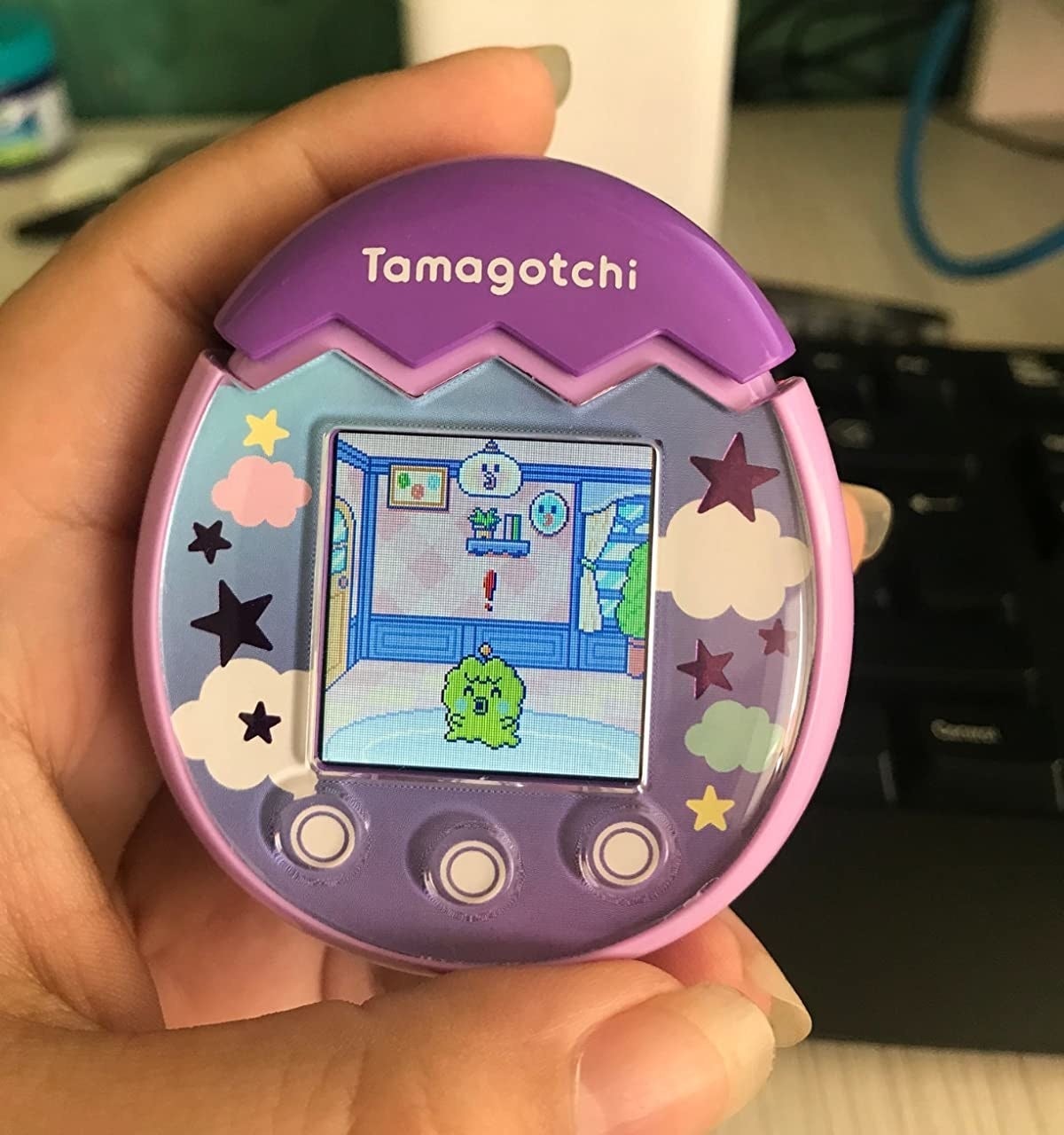 a review photo of the tamagotchi pix in pink