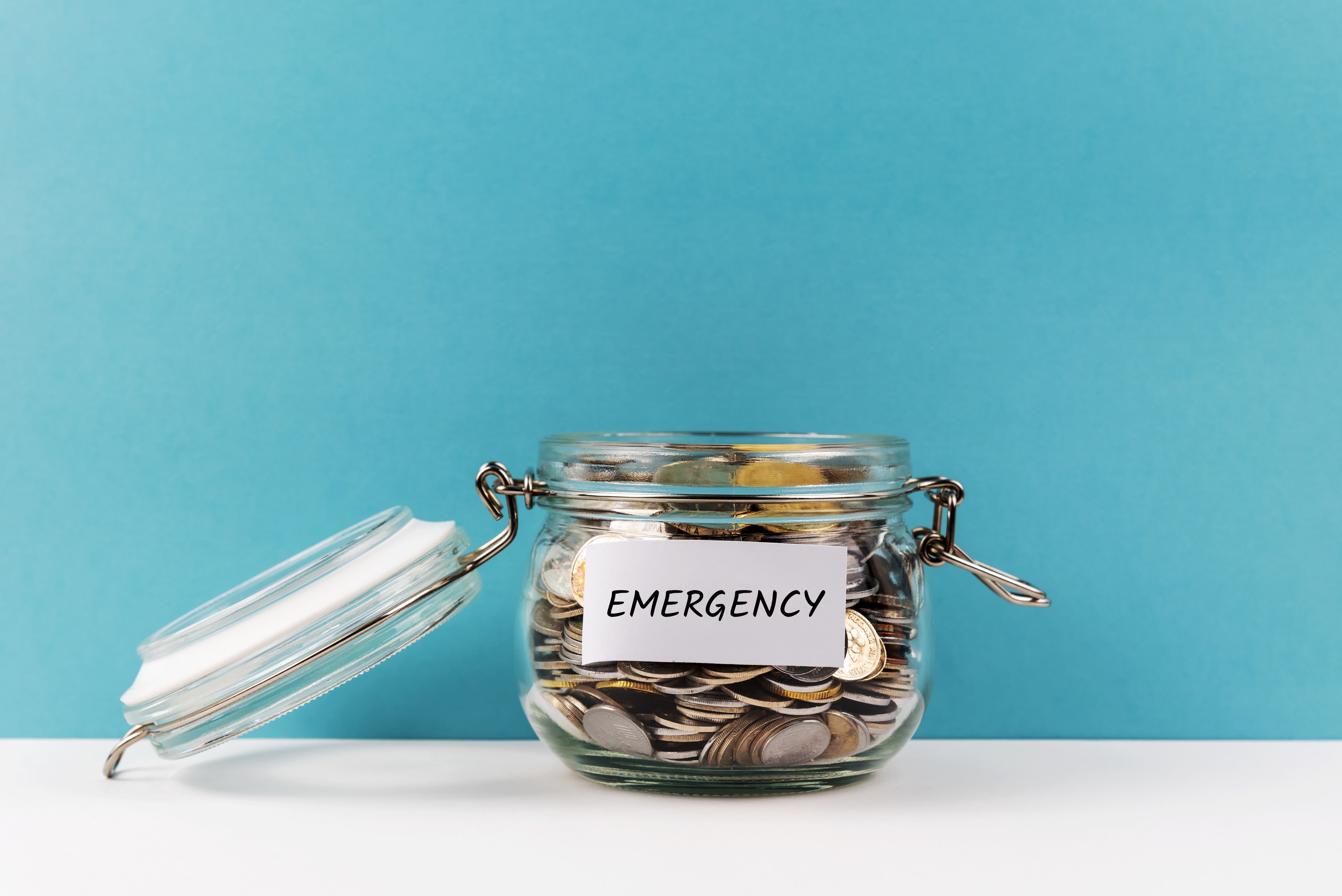 Coin jar labeled emergency