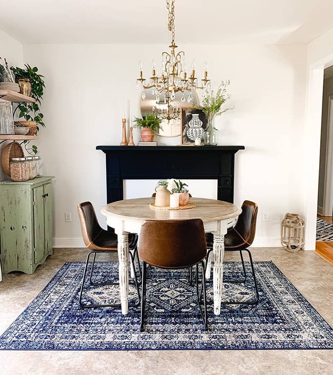 The blue and white brushed patterned rug in a reviewer's dining room