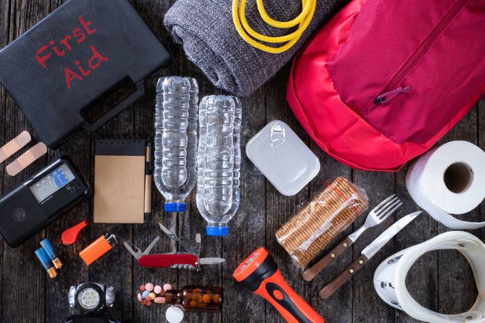 A deconstructed emergency kit laid out.