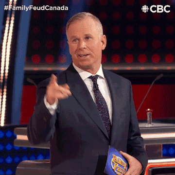 GIF of man pointing and smiling