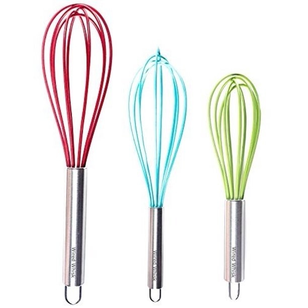 The red, blue, and green whisks of different sizes