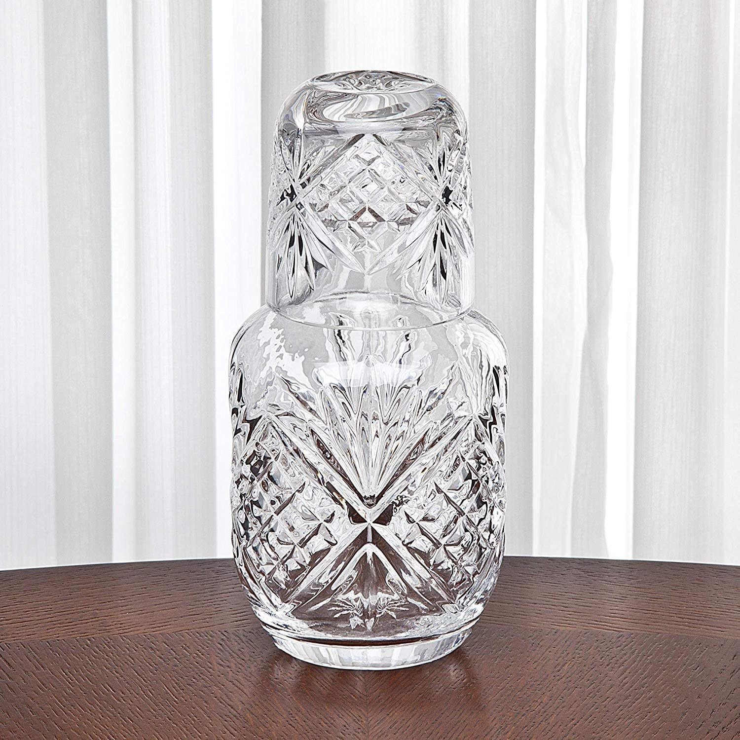 Crystal carafe on a wooden table