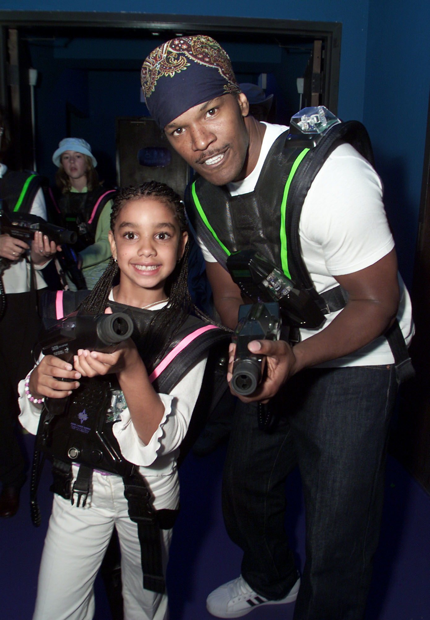 corinne and her dad ready for laser tag