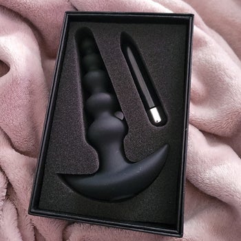 Vibrator in box next to removable bullet