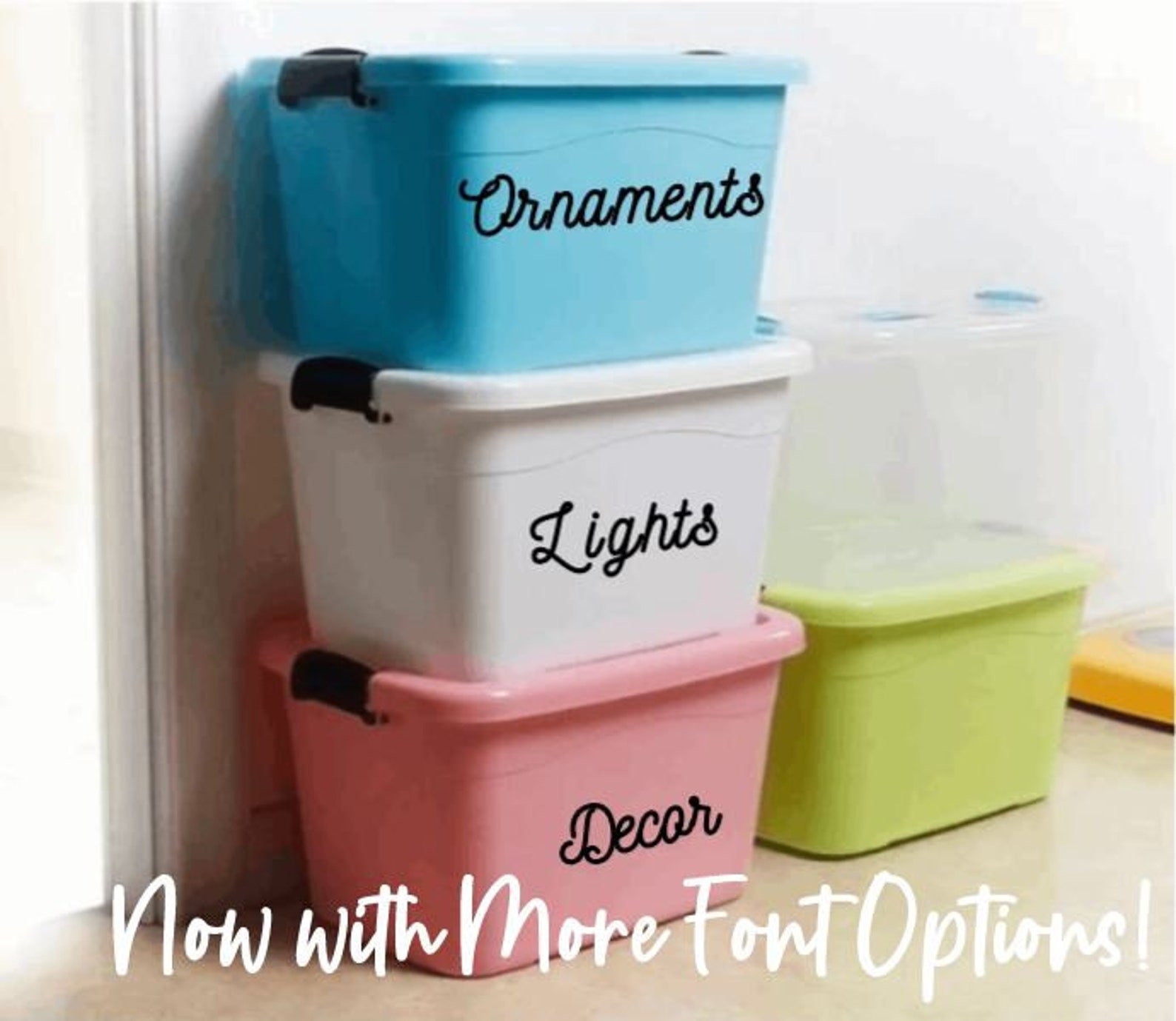 colorful plastic storage containers with labels on them saying decor, lights, and ornaments on them