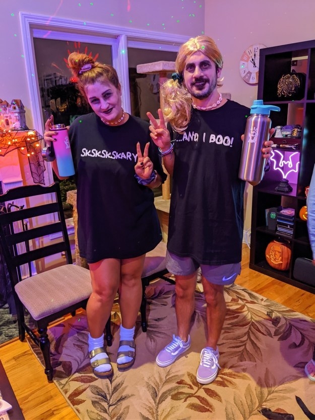 Two people with oversized tees, scrunchies, hydroflasks, and scary makeup