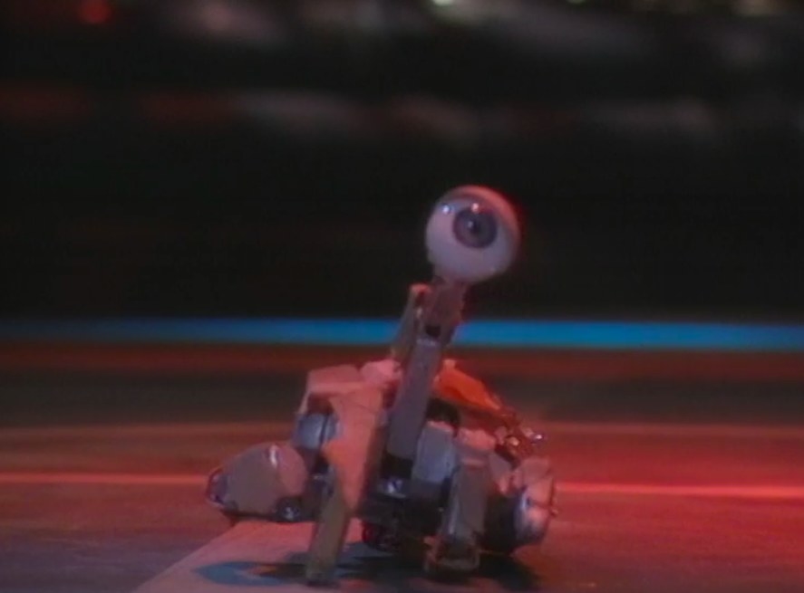 Kryten&#x27;s robotic hand with an eye stuck to the middle finger crawls along the floor