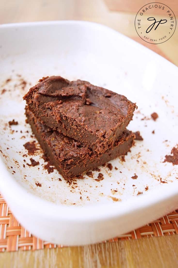 A piece of flourless brownie in an oven bowl