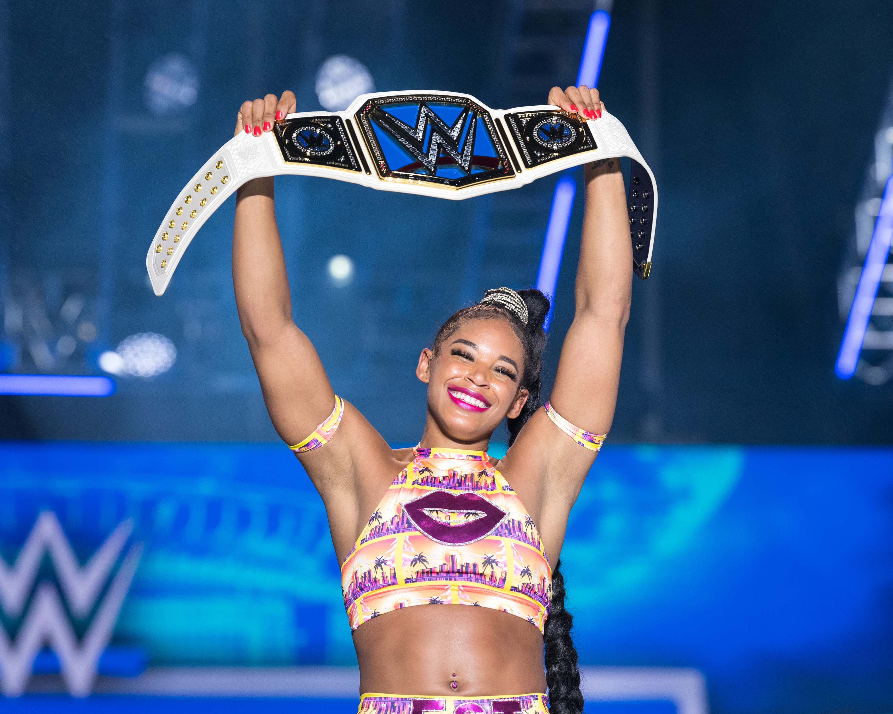 Bianca Belair holds up WWE women&#x27;s championship belt