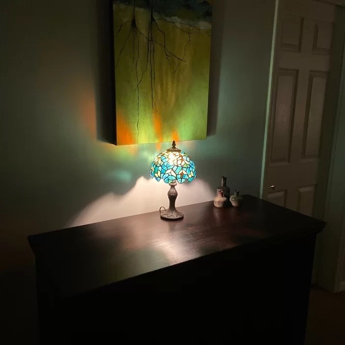 A mini Tiffany table lamp.