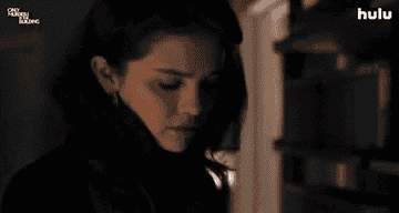 Gif of Mable in a black turtleneck