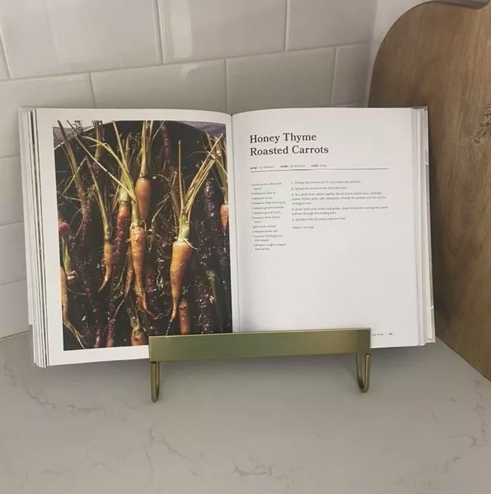 Reviewer's photo of the stand holding her cookbook open