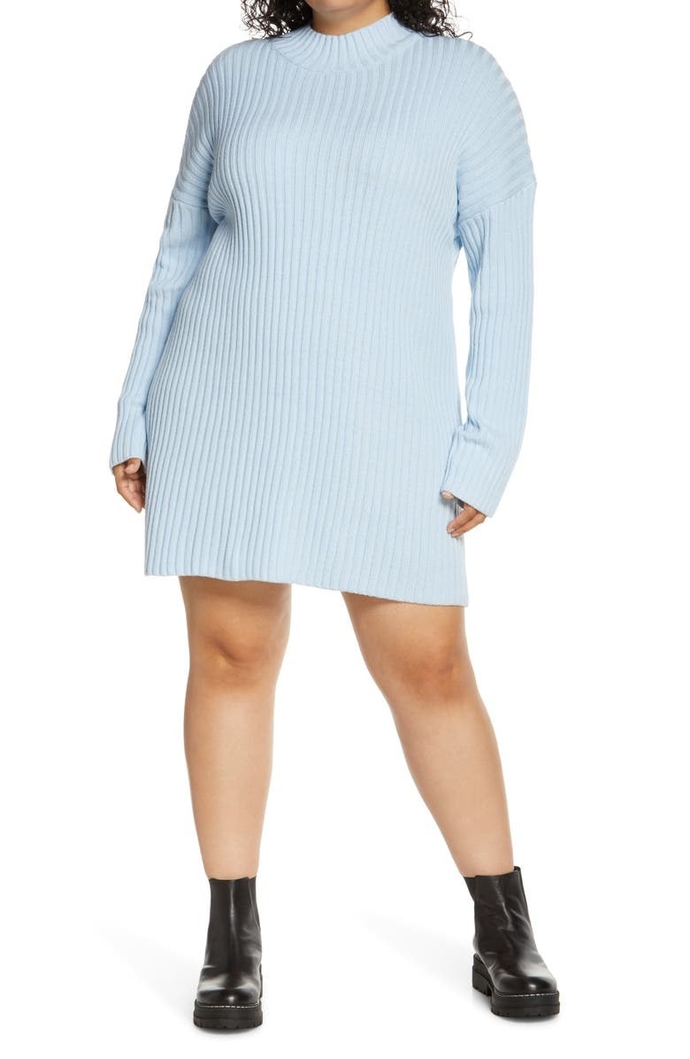 model wearing the blue sweater dress