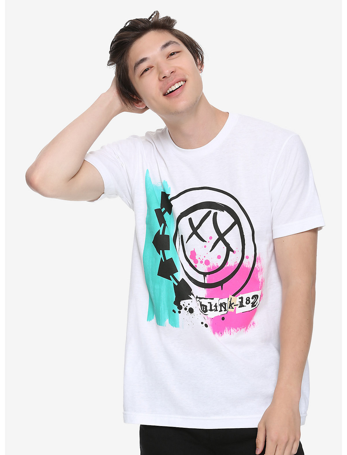 a model in a white tee with the blink-182 logo on it