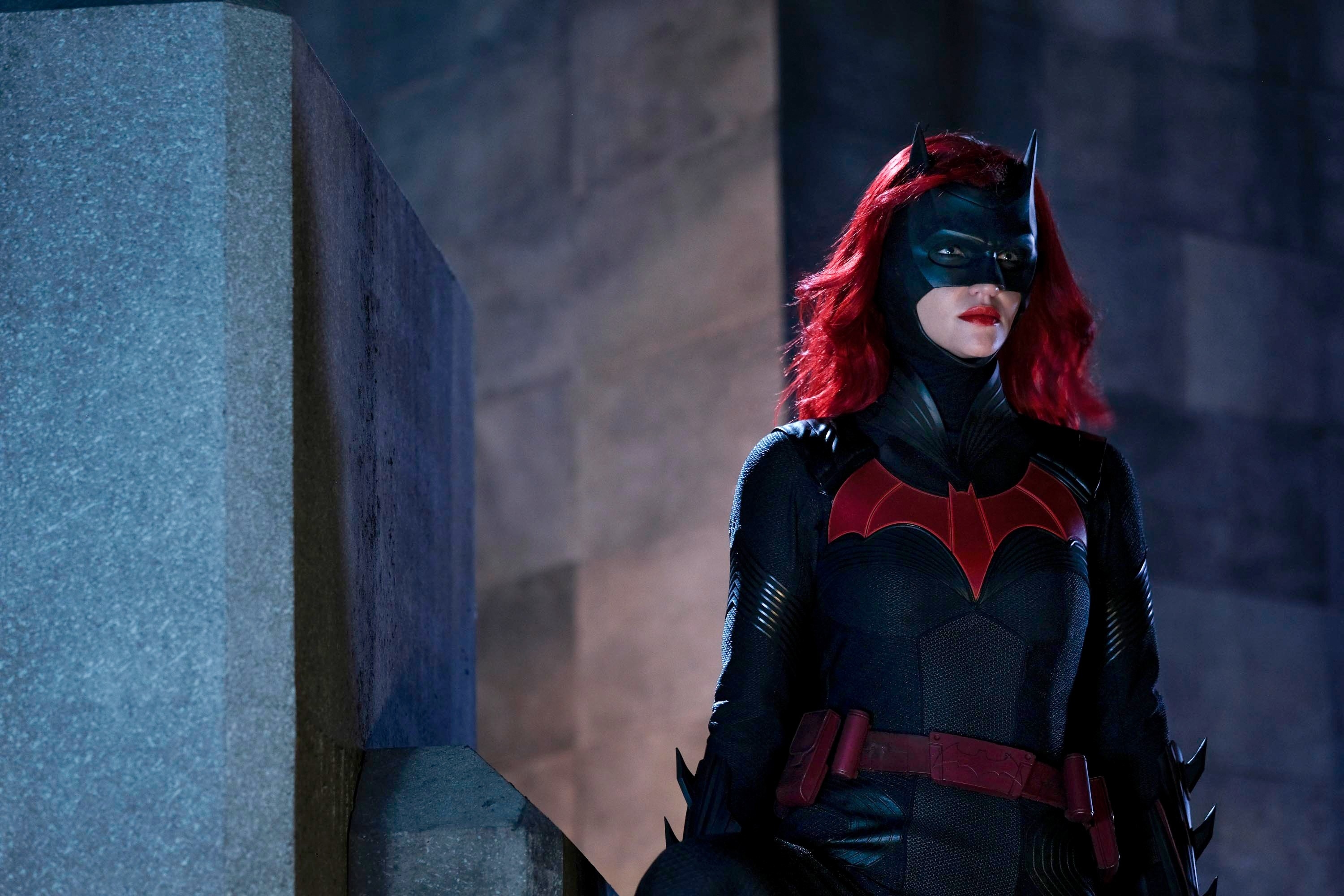 Rube looking off-screen as Batwoman