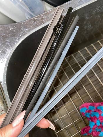 Reviewer shows the straws opened for cleaning